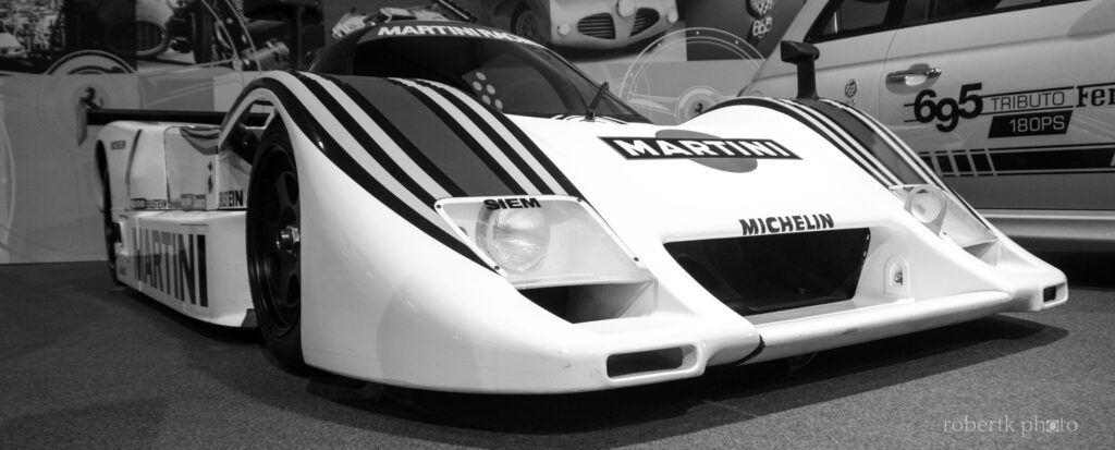 Monochrome Martini-liveried Ferrari racing car on display
