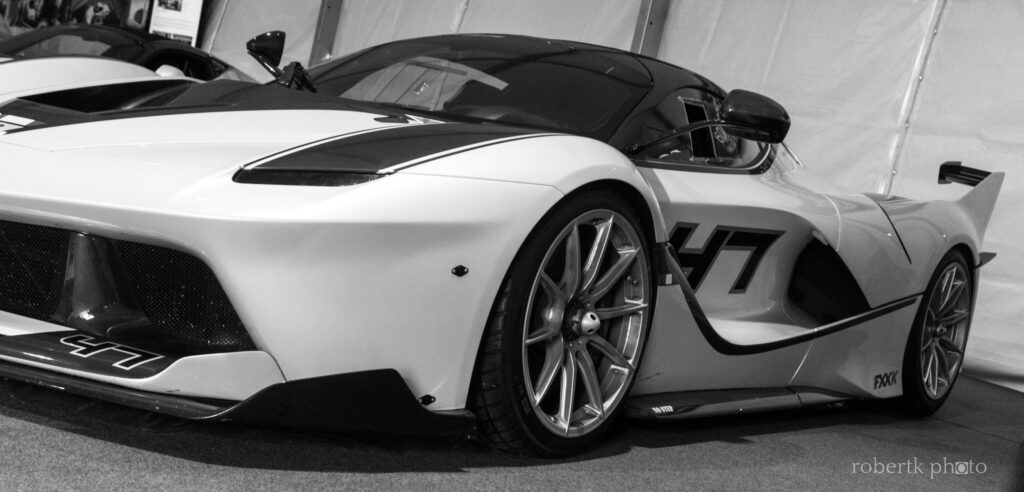 White GT3 race car number 93 photographed at an exhibition